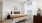 bedroom with a large window and night stands