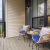 balcony with chairs and a table